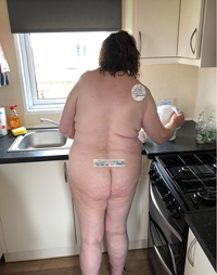 Nude in the kitchen on holiday