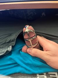 Got my little cock caged, wish I was getting fucked right now.