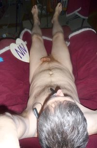 Above & behind my head, body view of my tong balmed dick as I am in my recl...