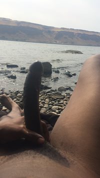 Having a quick rub on the river after laying out nude for about 2 hours. Ho...