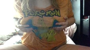 Gamer girl squeezing and pinching her big tits