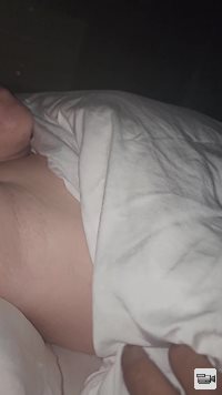 Playing with my wifes tit while she's asleep!