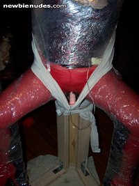 Wrapped and taped to the chair.  She was here for 1.5 hours, and three orga...