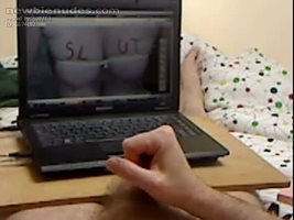 cumming whilst looking at a hot pic