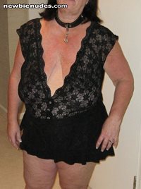 Slut with her new see thru blouse and micro mini skirt.