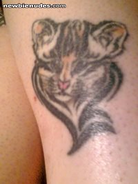 My ocelot cub with tribal that I got done 12 years ago!