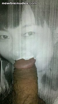 cock in the Chinese girl's mouth. make your comments on her.