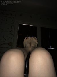 Legs n feet...freshly manicured toenails.