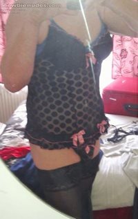 dressed in Jane's sexy undies taking a selfie in her bedroom mirror