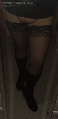 Boots, stockings and no knickers.