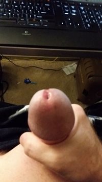 Stroking my cock.